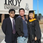 Haijiao Sun (middle) graduated from Troy in Dec. 2013.